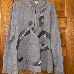 Calvin Klein hoodie. Doesn’t have pockets. Worn once.